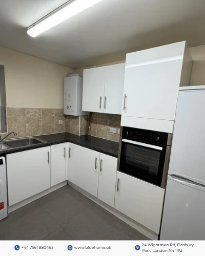 Property marketing carousel frame showing a fitted kitchen