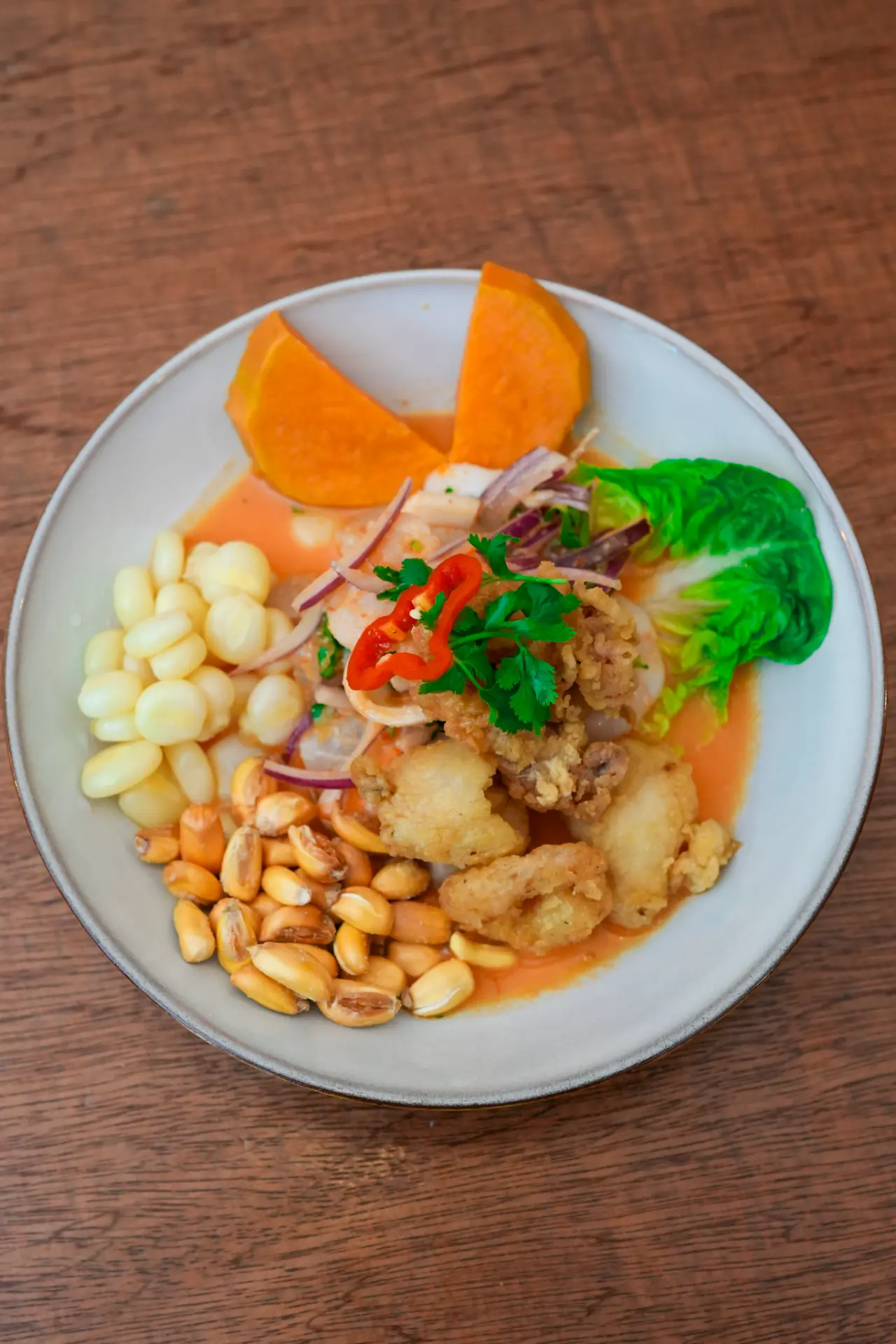 Maka's ceviche with choclo, cancha, sweet potato and crisp seafood