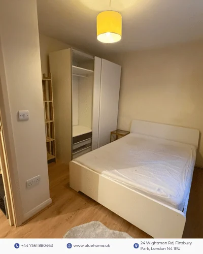 Property marketing carousel frame showing a bedroom with a wardrobe